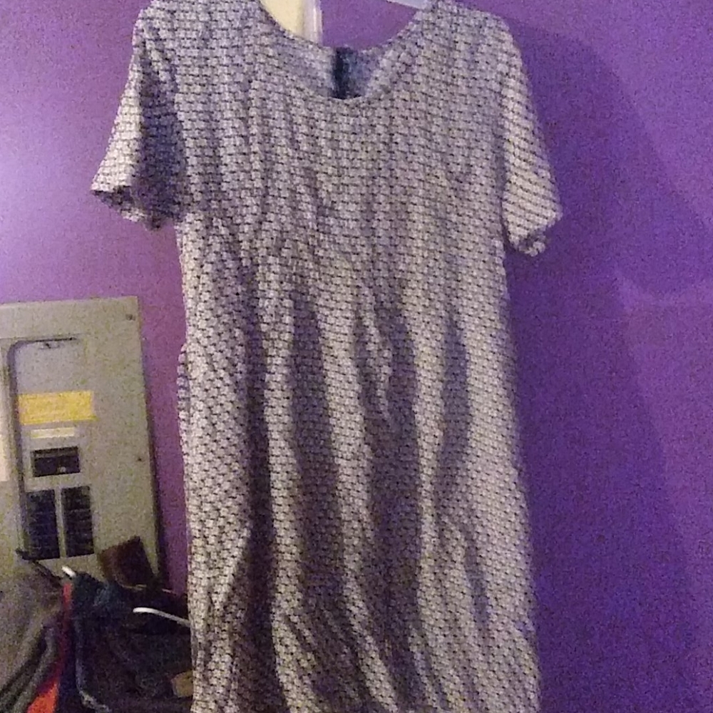 Womans sundress ties around back of waist